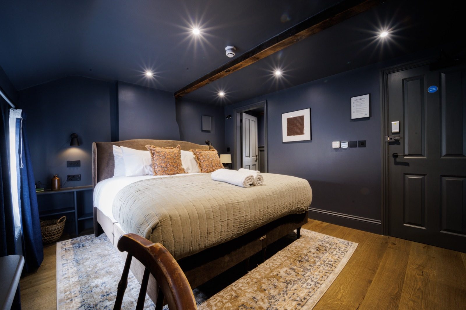 Room 4 at The Silk Rooms, a boutique bedroom with a super king bed, photo 1